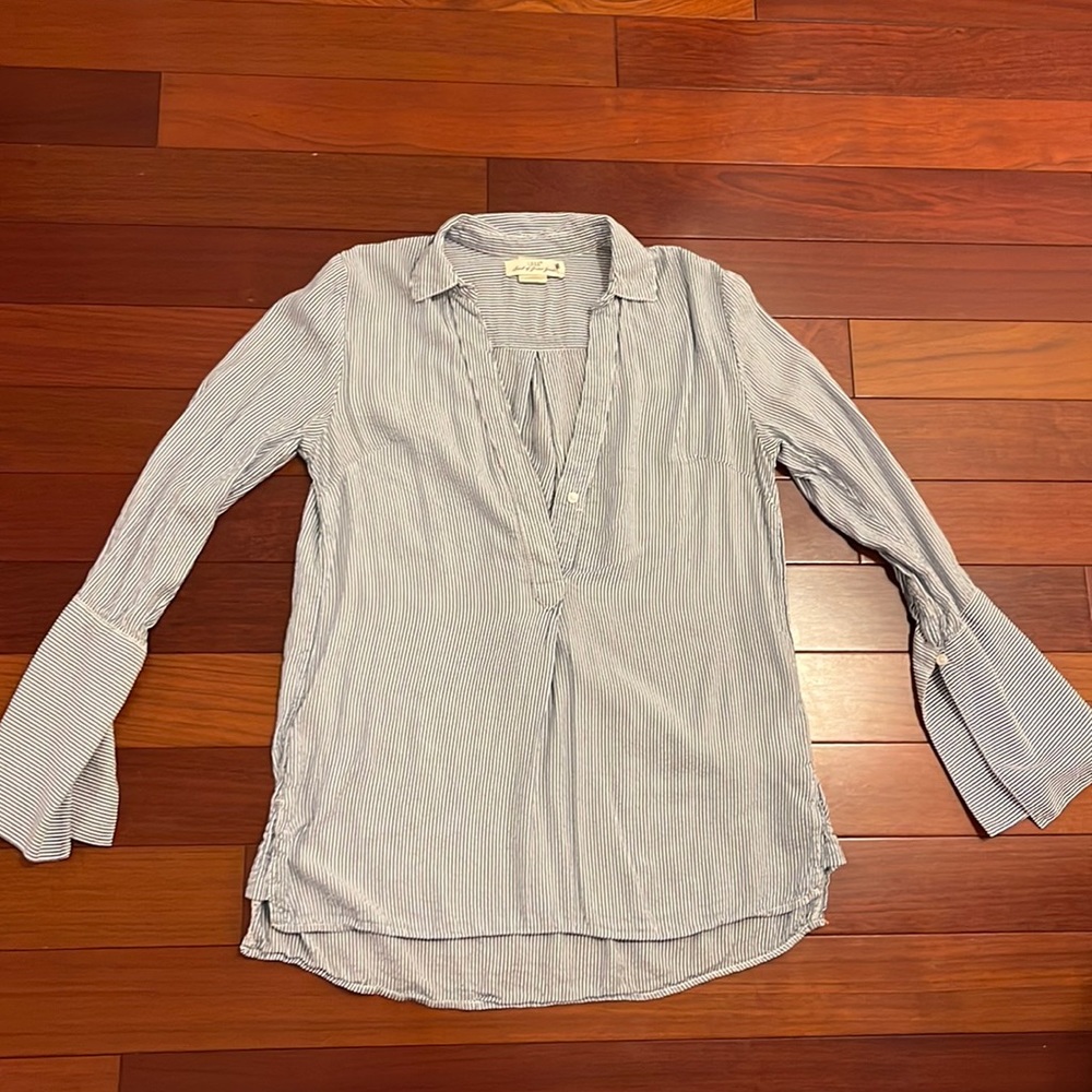 Navy and white striped blouse with bell sleeves and collar